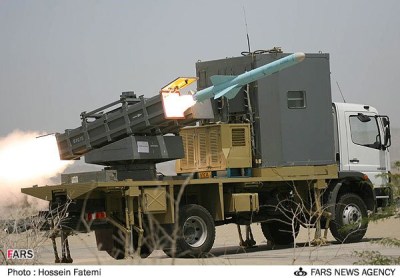 Firing a Chinese-manufactured C-802 anti-ship cruise missile