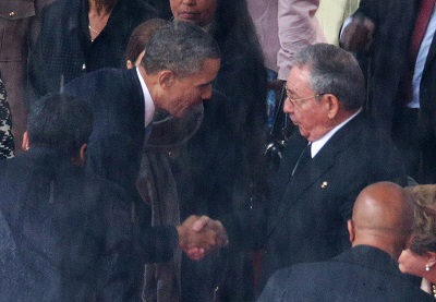 Obama shakes hands with communist dictator Castro