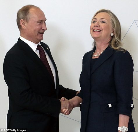 Hillary Clinton and Vladimir Putin shake hands, such a happy occasion