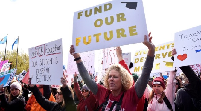 When I want a raise, I work harder, but these teachers hold up signs