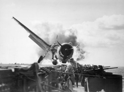 Lt. Walt Chewning charges unto burning F-6F Hellcat to save trapped pilot
