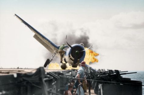 Lt. Walt Chewning charges unto burning F-6F Hellcat to save trapped pilot