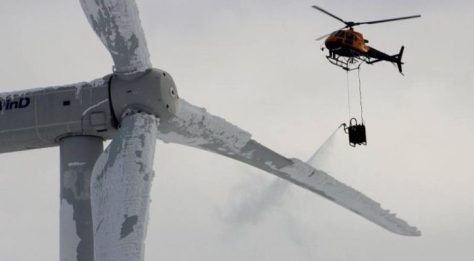 Environmentalists burning helicopter fuel to de-ice wind turbines one at a time